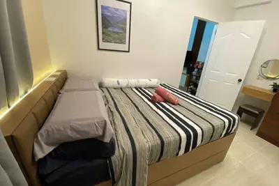 Image de Seven-Eleven Inn - Stylish Fully Furnished 1-Bedroom Apartment in Mactan Island