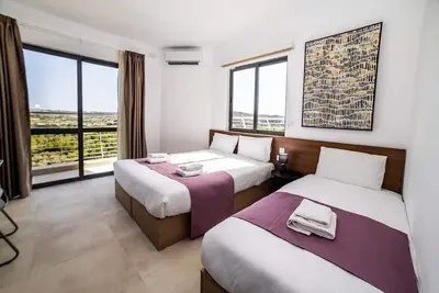 Bright Triple Studio Apartment with Balcony by HostMT