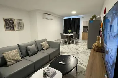 Image de Family 2-Bedroom Apartment – by HostMT