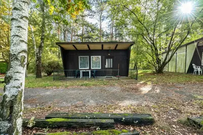 Image de Bungalow '14 - Kimbucht' avec terrasse privée et jardin commun