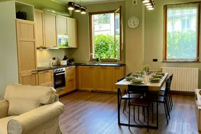 Image de Bnbook – Stylish Comfort and Quiet Living Near Milan, up to 6 personSpacious 4-room apartment with a Provençal touch, surrounded by greenery and perfect for families or business staysWelcome to your peaceful retreat in Rho! Nestled inside a charming c