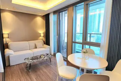 Image de L28[Newly Built/합법숙소][고층 사이드오션뷰/야외테라스/해변5분/지하철역3분]