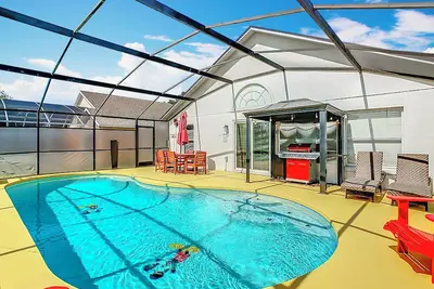 Image de Mickey themed villa/private pool/Gameroom/gated/golf/ 20 minutes to theme parks