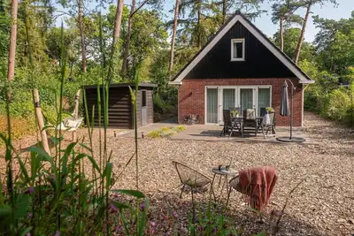Image de De Koekoek I Modern en vrijstaand vakantiehuis in het bos