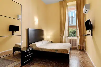 Image de Chambre « Camera matrimoniale » avec jardin partagé, Wi-Fi et climatisation