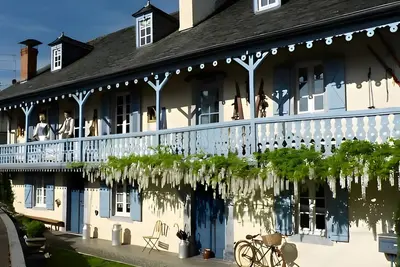 Image de Maison de vacances « Gîte La Petite Gourmande » avec terrasse partagée, jardin commun et Wi-Fi