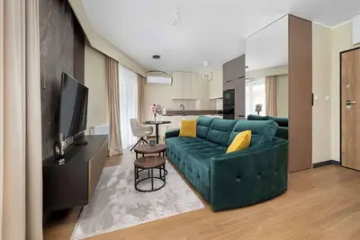 Image de Stylish Apartment with Air Conditioning and Underground Parking by Noclegi Renters