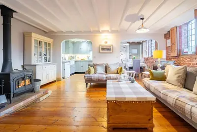 Image de The Old Smithy in Great Walsingham still has the original sign over the door, and whilst packed with