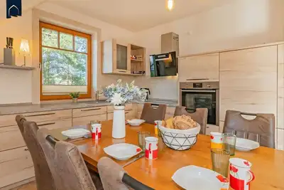 Image de Modern vacation apartment with sauna & garden - space for 8 guests near the beach -