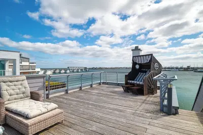 Image de Seestern - sea view, at the harbor basin, sauna, whirlpool, fireplace, roof terrace,