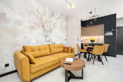 Image de Al. Kopisto 11 Rzeszów | Black and Yellow Apartment with Air Conditioned Living