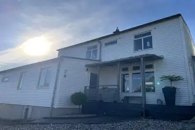 Image de Maison en bord de mer à Sandvik avec piscine
