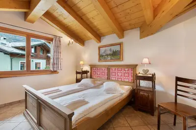Image de Appartement 'Trilocale 2' avec vue montagne, terrasse partagée et Wi-Fi