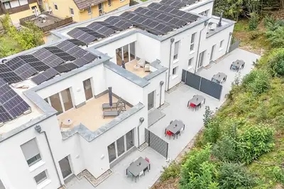 Image de LUMlFLATS: 4 Zimmer / E-Ladestation / Dachterrasse