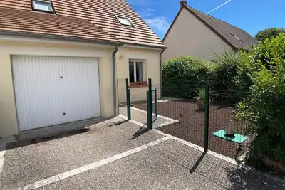 Image de Une petite maison avec un joli jardinet pour se reposer