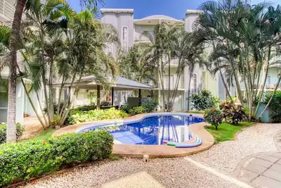 Image de Beachside Chill Condo – Pool & Surf Nearby