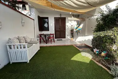 Image de Maison de Vacances 'Rosa Dei Venti - Calasetta' avec Terrasse Privée, Wi-Fi et Climatisation