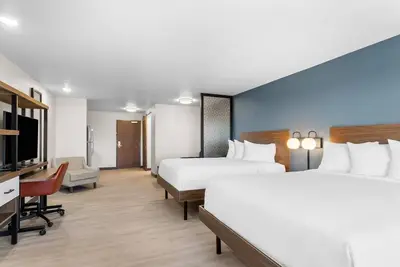 Image de Enjoy Clean and Bright Suite with Kitchen, Gym Access, and Free Parking