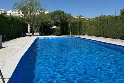 Image de Appartement « Comodidad près du centre de Grenade » avec piscine partagée, Wi-Fi et climatisation