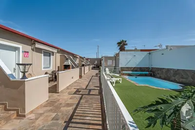 Image de Appartement de vacances '3 Apartamentos Omanai Tenerife Sur' avec jardin commun et Wi-Fi