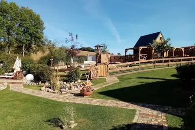 Image de Gîte \"Du poil à la plume\" avec bain nordique.