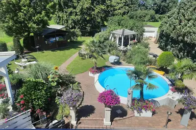 Image de Cozy vacation apartment in the countryside incl. pool and lots of nature.