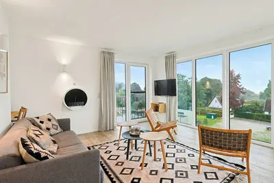 Image de Bel appartement pour 8 personnes avec bain à remous, piscine, Wifi, Tv, balcon et animaux admis