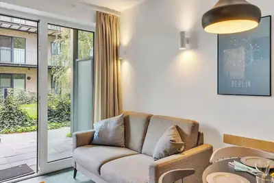 Image de Agréable appartement avec bain à remous, Wifi, piscine, Tv, terrasse et animaux admis