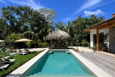 Image de 4br / 4. 5ba Beach Path Villa in Hacienda Pinilla · Pool · Barefoot Luxury