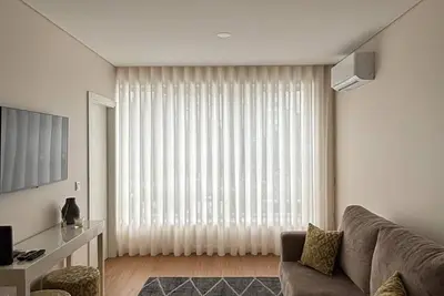 Image de Appartement 'Esconderijo Da Boavista' avec Wi-Fi et climatisation