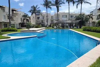 Image de \"Beautiful apartment with pool just steps from the sea - Caracol Diamante\".