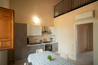 Image de Appartement 'Vigna Di Pettineo - N9' avec piscine partagée, terrasse privée et climatisation