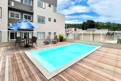 Image de 3 minutes from the beach in the center of Bombinhas. Fully equipped apartment.