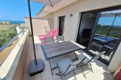 Image de Appartement neuf climatisé avec terrasse – Agosta, plage et commerces à pied