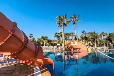 Image de Appartement de vacances 'Oasis Duna Sol Y Sal Pool' avec piscine partagée, terrasse privée et Wi-Fi