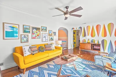 Image de Vibrant Hidden Bookcase Door 4Bd  Garage Game Room