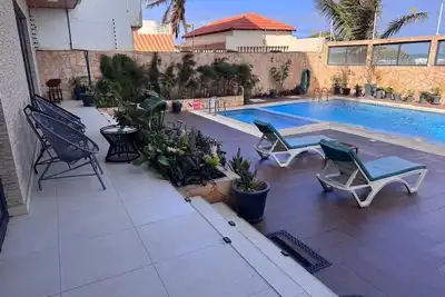 Image de AlAwane 1a Merveilleux T3 Pied dans l'eau Pisc /Amazing Beachfront 2-BdrS Pool