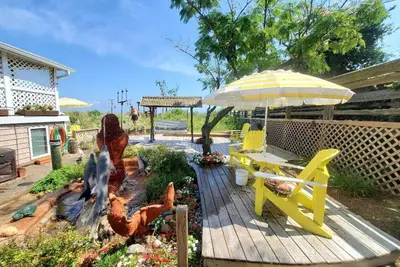 Image de 902 Ch Historic Carriage House 20 Steps to Beach + Hot Tub, Kayaks, Beachfront Grilling
