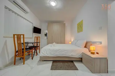 Image de A lovely fully equipped Studio w/ strong Wifi & Ac