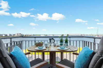 Image de Undine - balcony with water view, washing machine, own parking space, 3 TVs, barbecue