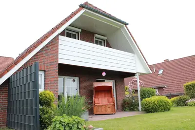 Image de Maison de vacances Achterdeck avec terrasse commune, jardin et balcon