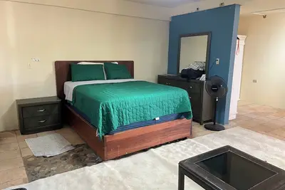 Image de Arequipa Suite 3 queen size beds, a terrace leading to the pool and the beach.