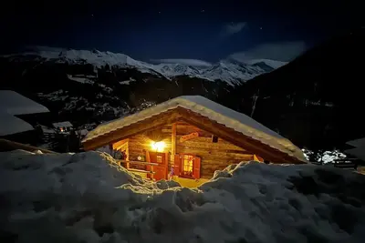 Image de Chalet très confortable pour 3-5 personnes : living avec fourneau à bois - cuisine avec lave-vaissel