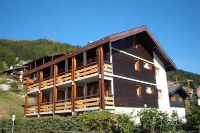 Image de 3 pièces pour 4 personnes : Living - 1 chambre à 1 lit double - 1 chambre à 2 lits superposés - cuis