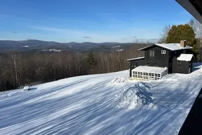 Image de views of Sugarbush and Scragg Mtn. Three miles of hiking Heated 2 car garage,