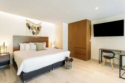 Image de Boho-Lux Loft in Mistiq Temple Ii. Rooftop Pool. 10 min from the beach.