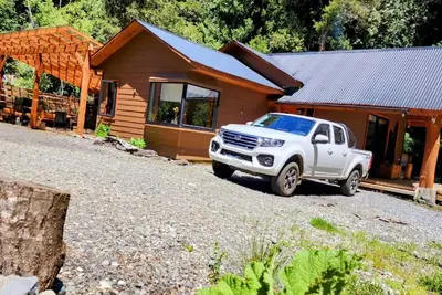 Image de Enjoyed and comfortable cabin 15 min from Playa Coñaripe, 5 min from hot springs and waterfalls.