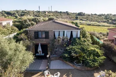 Image de <b></b><b>Casa Li Feruli</b> is situated in the peaceful village of Paduledda in northern Sardinia, just 3, 5 km from <b>Isola Rossa</b>. The house is surrounded by a well-kept garden and is located slightly above the coast. It enjoys an open view of the