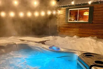 Image de Chalet rustique en bois rond près des sentiers de Vtt, skidoo, pêche et chutes!