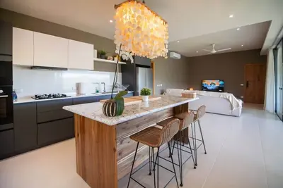 Spacious modern condo @ popular Las Ballenas beach